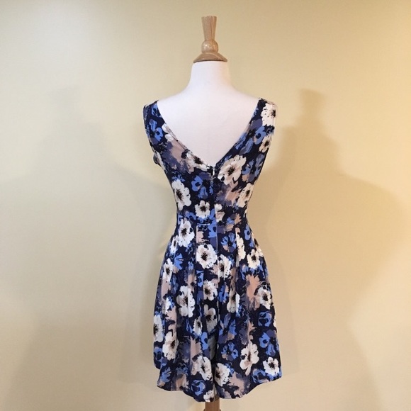 Flirty Cutout Front Deep V Back Floral Romper - Picture 6 of 6